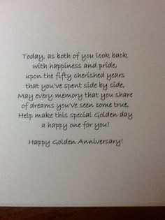 an anniversary card with the words today, as both of you look back on happiness and pride