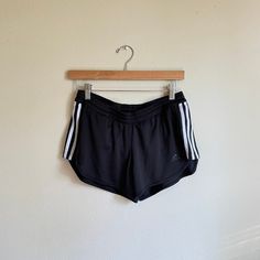 Y2k 00s era vintage adidas shorts. very short with a mid / low rise. Label: Adidas climalite Material: body: 100% polyester lining: 92% polyester 8% spandex Size on label: M Modern Size: fits a small/medium Good Vintage Condition - a few minor snags. zoom in on photos for details MEASUREMENTS IN INCHES (laid flat double where needed) : WAIST: 15, stretches to 19.5 (meant to sit below belly button)/ HIP: 20 / RISE: 10 / INSEAM: 3 Each vintage piece has been preloved. Minor fading + wear is expected & often adds to the character. All items are cleaned & from a smoke & pet free building. We hope you appreciate this find as much as we do. FINAL SALE Sporty Three Stripes Shorts, Casual Adidas Logo Shorts, Sporty Three Stripes Athletic Shorts, Sporty Three-stripe Athletic Shorts, Sporty Athletic Shorts With Three Stripes, Sporty Shorts With Three Stripes, Athleisure Athletic Shorts With Three Stripes, Streetwear Athletic Shorts With Three Stripes, Streetwear Shorts With Three Stripes