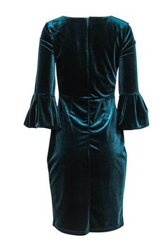 Go holiday haute couture with this festive frock from ABS Collections! The simple sheath dress is upgraded with billowy bell sleeves and super soft velvet in a rich dark teal hue. Perfect for wherever the season takes you! Whether you’re gathering around the table for Thanksgiving dinner or singing carols by the Christmas tree, pair this beauty with sparkly pumps and a bold red lip and you’ll be looking totally merry and bright! Size 6 Shell: 90% Polyester, 10% Spandex Lining: 92% Polyester, 8% Elegant Green Velvet Dress For Fall, Green Velvet Dress For Fall, Elegant Fitted Green Velvet Dress, Green Velvet Fall Dress, Elegant Christmas Velvet Dresses, Elegant Blue Velvet Dress, Elegant Fitted Velvet Holiday Dress, Elegant Blue Christmas Dress, Fitted Blue Velvet Dress