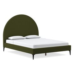 a bed with a green headboard and white sheets on it's sides, in front of a white background