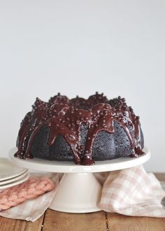 a bundt cake with chocolate frosting on top