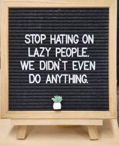 a sign that says stop hating on lazy people we didn't even do anything