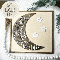 a wooden sign that says you're the moon and stars