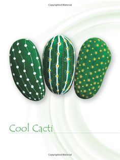 three green and yellow cactus shaped rocks with stars on them, against a white background