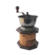 an old fashioned coffee grinder is on display