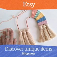 an advertisement for etsy's unique items, including yarn and tassels