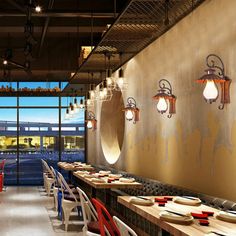 an empty restaurant with many tables and chairs