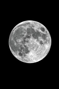 the full moon is seen in the dark sky