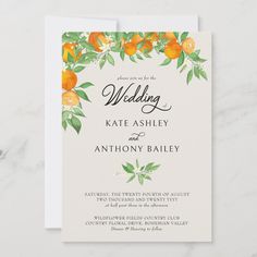 an orange and green wedding card