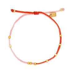 Show off your sweet side with this red and pink bitty braid bracelet from Pura Vida that's accented with a scattering of gold-plated beads. This simple, two-toned piece adds the perfect blend of soft pastel and bold bright color to your bracelet stack with glimmering beaded detail throughout. | Pura Vida dainty bracelet features braided red and pink string with gold-plated beads. | Includes gold-plated metal Pura Vida charm. | Adjustable from 2-5 inches in diameter. Pura Vida Bracelets Diy, Braid Bracelet, Dainty Gold Bracelet, Gold Waves, Pura Vida Bracelets, Dainty Bracelet, Dainty Bracelets, Pink And Red, Pink Bracelet