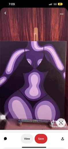 a painting of a woman's torso on a black and purple background with wooden easel