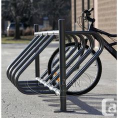 there is a bike rack on the sidewalk