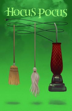 three brooms are hanging on a green background with the words hoccus pocus above them