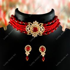 This is a stunning handmade choker necklace perfect for high end Jewelry Collector, a keeper in Traditional Vintage Indian/Pakistani Bridal jewelry and a Luxury Gift for your Daughter, Sister or Wife on Wedding or Anniversary. Perfect for any type of occasions, weddings And celebrations and a beautiful & memorable gift for weddings and special occasions. Description  Item Code:- M Gold Plated Zircon & Red Onyx Beaded Choker Necklace Necklace Measures- Adjustable with a Dori/Cord Earring Measures- 36x13mm approx Quantity- One Necklace Set Please see more different designs here:- https://www.etsy.com/in-en/shop/LUCKYJEWELSART?ref=seller-platform-mcnav I make every item of my collection with a lot of love and care, I pay attention to every detail.  You are more than welcome to contact me for Luxury Gift Red Bridal Necklace, Luxury Red Kundan Necklace For Gifting, Luxury Red Bridal Necklace, Traditional Luxury Kundan Choker Necklace, Luxury Red Choker For Gift, Luxury Red Kundan Necklace For Gift, Luxury Traditional Red Bridal Necklace, Red Kundan Necklace With Gemstones As Gift, Red Choker With Large Beads As Gift