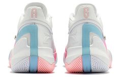 a pair of white and blue sneakers with pink soles