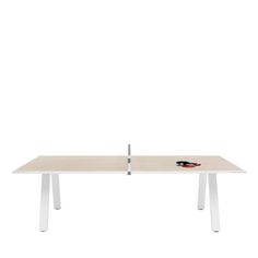 a white table with a wooden top and two metal legs on each side, in front of a white background