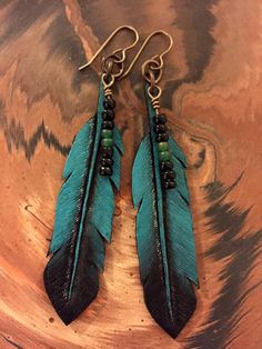 Turquoise & Black leather feather earrings are handmade by Stones River Leather and are approximately 3 inches long from the top of the solid brass ear wires to the tip of the leather feathers. They are hand carved and hand painted and are strung with Czech glass beads. All Black Leather Earrings, Feather Earrings Diy, Leather Feathers, Beaded Feather, Leather Feather Earrings, Handmade Leather Jewelry, Diy Leather Earrings, Leather Jewelry Diy, Leather Jewels