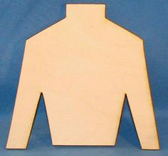 a wooden cutout of a man's shirt on a blue background