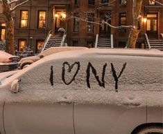 a car covered in snow with the word cony written on it