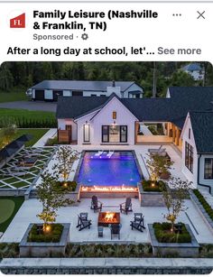 an aerial view of a house with a fire pit in the middle and landscaping around it