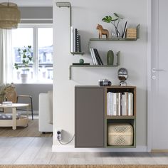 a living room filled with furniture and decor