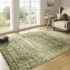 a living room with a large rug on the floor next to a chair and window