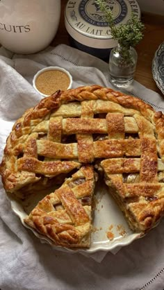 a pie sitting on top of a white plate