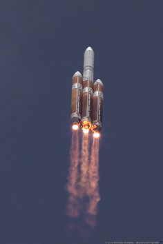 an image of a space shuttle taking off