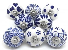 blue and white ceramic knobs with flower designs