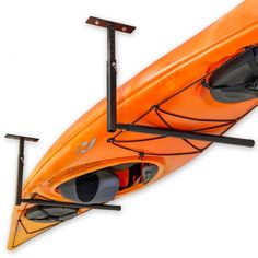 an orange kayak with two oars attached to it