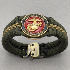 This is an enlisted Marine Corps paracord bracelet. Gold plated Eagle Globe and Anchor. Makes a perfect USMC gift for any veteran or active duty Marine. Unique top shelf quality jewelry. Great retirement gift. Semper fi. *Gold plated enlisted Eagle Globe & Anchor *1 1/4" wide USMC medallion. Only 9mm thick *3/4" wide weave *Exact official USMC colors *Quality Cobra tactical buckle *Very comfortable *I am an official USMC licensee; license number H294-23 *Handmade in the USA I weave my proprietar Usmc Gifts, Eagle Globe Anchor, Eagle Globe And Anchor, 550 Cord, Military Gift, Bracelets Easy, Semper Fi, Diy Bracelets Easy, Gifts For Veterans