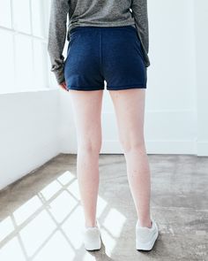 These are just about the coziest shorts you'll ever find, made from our signature Flowknit material. With a bit of stretch, they're designed to move with you - whether you're on a run, running errands, or not running at all. Our Flowknit is made from Global Recycle Standard poly yarn, which diverts and recycles plastics destined for landfill or the ocean, so you can feel and look good in what you wear.  | Quince | Women's Super Soft Performance Shorts in Navy, Flowknit Activewear, Size XS, Recyc Stretch Athleisure Shorts For Loungewear, Comfortable Short Leg Loungewear Activewear, Stretch Athletic Shorts For Loungewear, Comfortable Workout Pajama Shorts, Comfy Short Length Activewear, Casual Biker Shorts With Ribbed Waistband, Comfortable Shorts With Ribbed Waistband For Lounging, Athleisure Shorts With Comfort Waistband For Loungewear, Comfortable Lounging Shorts With Ribbed Waistband