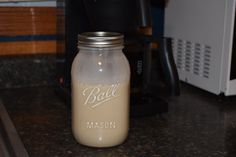 a mason jar sitting on top of a counter