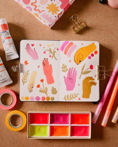 an assortment of crafting supplies laid out on top of a table next to each other