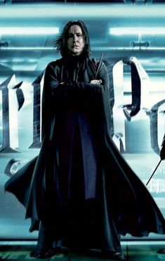 the character harry potter is standing with his arms crossed