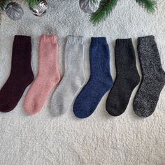 Our handmade socks are made of alpaca wool that makes the socks very warm, temperature regulating & odour repellent. Plus, the hypoallergenic properties make these socks ideal for anyone with sensitive skin or allergies. The unique blend of alpaca wool and other fibers (e.g. Acryl) makes them even stronger, softer, resistant to bobbling and more sustainable. That's why our alpaca socks keep the shape for longer time while wearing them. The top of the socks has ''a hidden thread'' that helps the Cozy Warm Solid Color Socks, Comfortable Thick Warm Socks, Thick Warm Comfortable Socks, Thick Warm Solid Color Socks, Cozy Outdoor Socks For Winter, Cozy Winter Socks For Outdoor, Cozy Wool Socks For Winter, Cozy Winter Outdoor Socks, Cozy Knitted Solid Color Socks