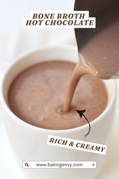 chocolate being poured into a white cup with the words bone broth hot chocolate and rich & creamy