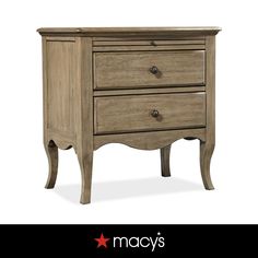 a wooden nightstand with two drawers on it's sides and the words macy's above it