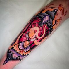 an artistic tattoo design on the arm