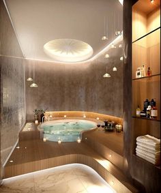 a bathroom with a large jacuzzi tub and lights