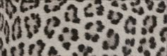 an animal print lamp shade is shown in black and white