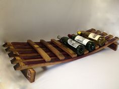 a wine rack made out of wooden planks