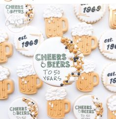 beer themed cookies with cheers and beers to 50 years written on the top, surrounded by other decorated cookies