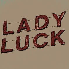 the words lady luck are written in red ink