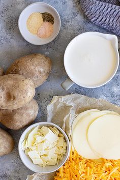 potatoes, cheese and other ingredients on a table