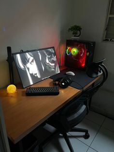 a desktop computer sitting on top of a wooden desk