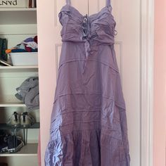 Cute Blue Midi Free People Dress! The Straps Are Adjustable And Tie Into A Bow. Really Flattering Around The Chest Area (Also Adjustable With Bows Across The Front Of It, And Elastic Band On The Back). Super Comfortable Dress, Flowy And Airy! Purple Cotton Summer Sundress, Summer Cotton Sundress In Purple, Summer Purple Cotton Sundress, Purple Sleeveless Cotton Maxi Dress, Purple Cotton Sleeveless Maxi Dress, Summer Cotton Purple Maxi Dress, Summer Purple Cotton Maxi Dress, Spring Purple Midi Cotton Dress, Spring Purple Cotton Midi Dress