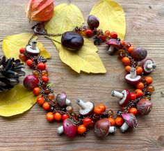 Mushroom Forest necklace with rowan berries, cornelian, tiger eye stones. Fall Autumn color jewelry with mushrooms. Woodland witch necklace. Pogan jewelry for fall forest lover. Vegetarian jewelry gift. Autumn inspired necklace Its mushroom season! Do you like to pick mushrooms in the fall? I love it very much! I adore the smell of forest and mushrooms! And I really miss our Carpathian mountains .. I could not be there this year. But I hope next year I will be able to visit these wonderful place Rowan Berry Necklace, Vegan Witch, Woodland Witch, Rowan Berries, Forest Necklace, Autumn Jewelry, Mushroom Necklace, Woodland Jewelry, Mushroom Forest