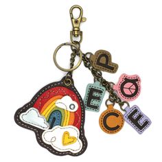 a keychain with several different patches and letters attached to it, including the letter e