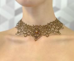 A wonderful frevolite necklace will decorate your look. Gold Macrame Choker Necklace, Handmade Delicate Choker For Gifts, Delicate Handmade Gold Choker, Handmade Victorian Choker For Wedding, Handmade Victorian Wedding Choker, Necklace With Stone, Tatting Necklace, Shuttle Tatting, Tatting Jewelry